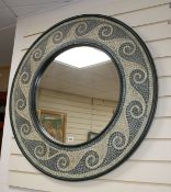A circular mosaic framed wall mirror, overall diameter 94cm Condition: Good condition