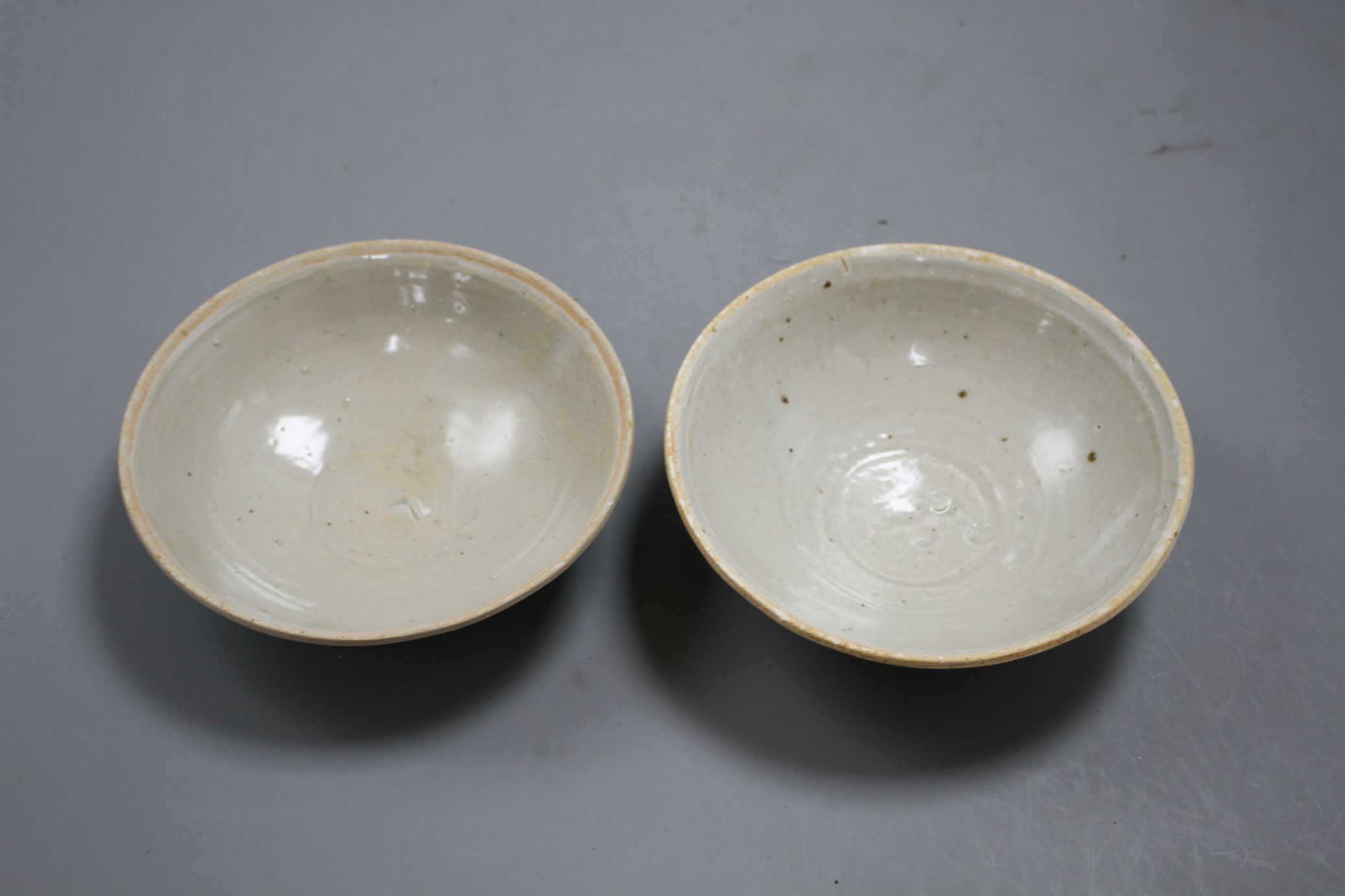Two Chinese Ding type bowls, Yuan-Ming dynasty, with unglazed rims, both with minor scratching to - Image 2 of 7