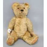 An Alpha Farnell bear, c.1950, 20in., original paw pads, one damaged, glass eyes, slight thinning to