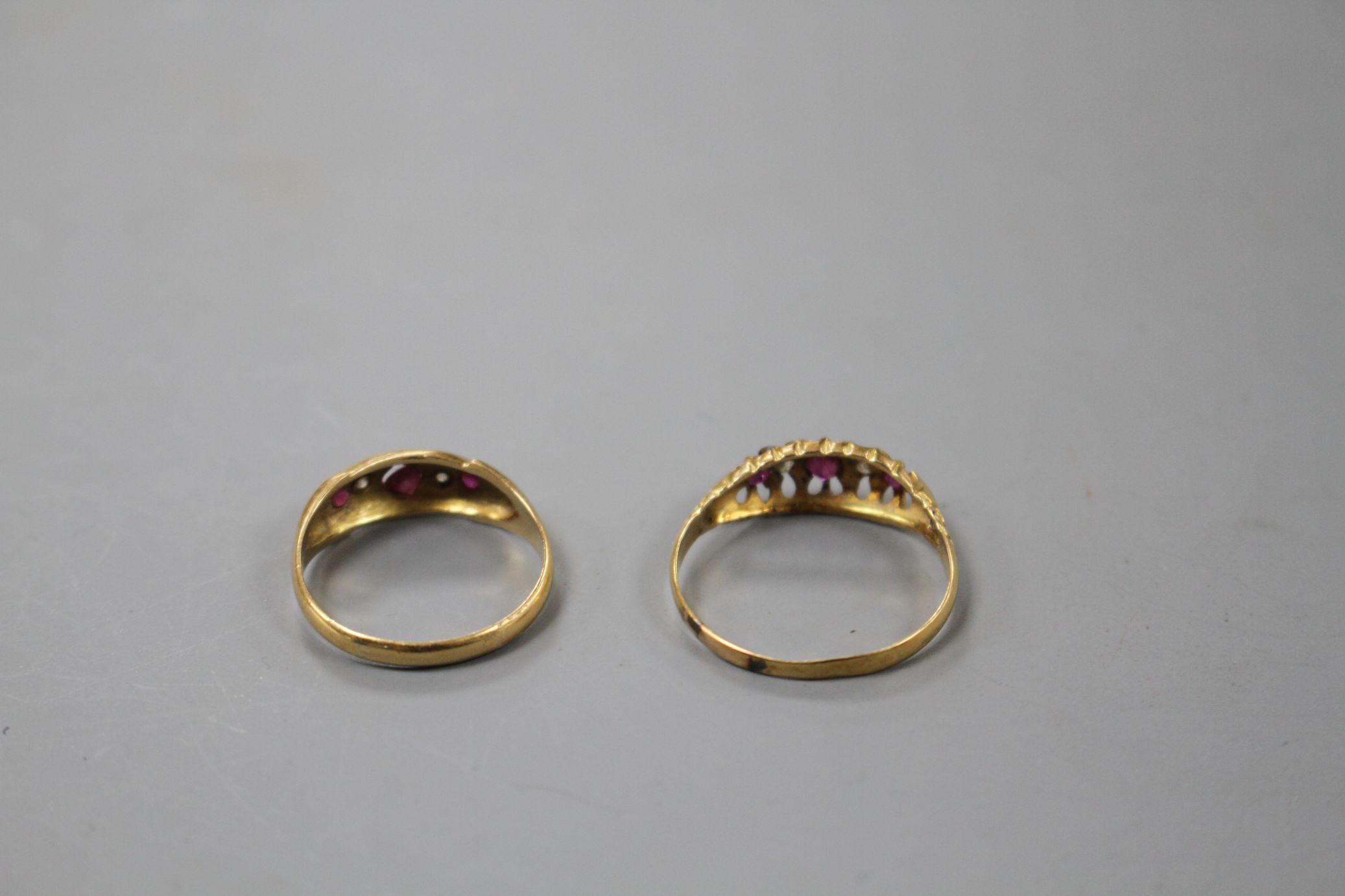 Two early 20th century 18ct gold, ruby and diamond set dress rings, sizes- N(3 stone) and R. Gross - Image 5 of 5