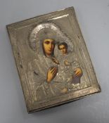 A Russian white metal overlaid tempera on panel icon, depicting the Virgin Mary and Christ child, 22