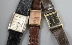 Three assorted gentleman's wrist watches, gold filled Longines, similar Bulova and silver cased,