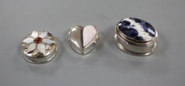 Three assorted modern silver pill boxes, including oval with hardstone lid, heart shaped and