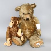 A Chiltern Hugmee bear c.1930's, 22in., velvet paids in dirty condition but good mohair, glass