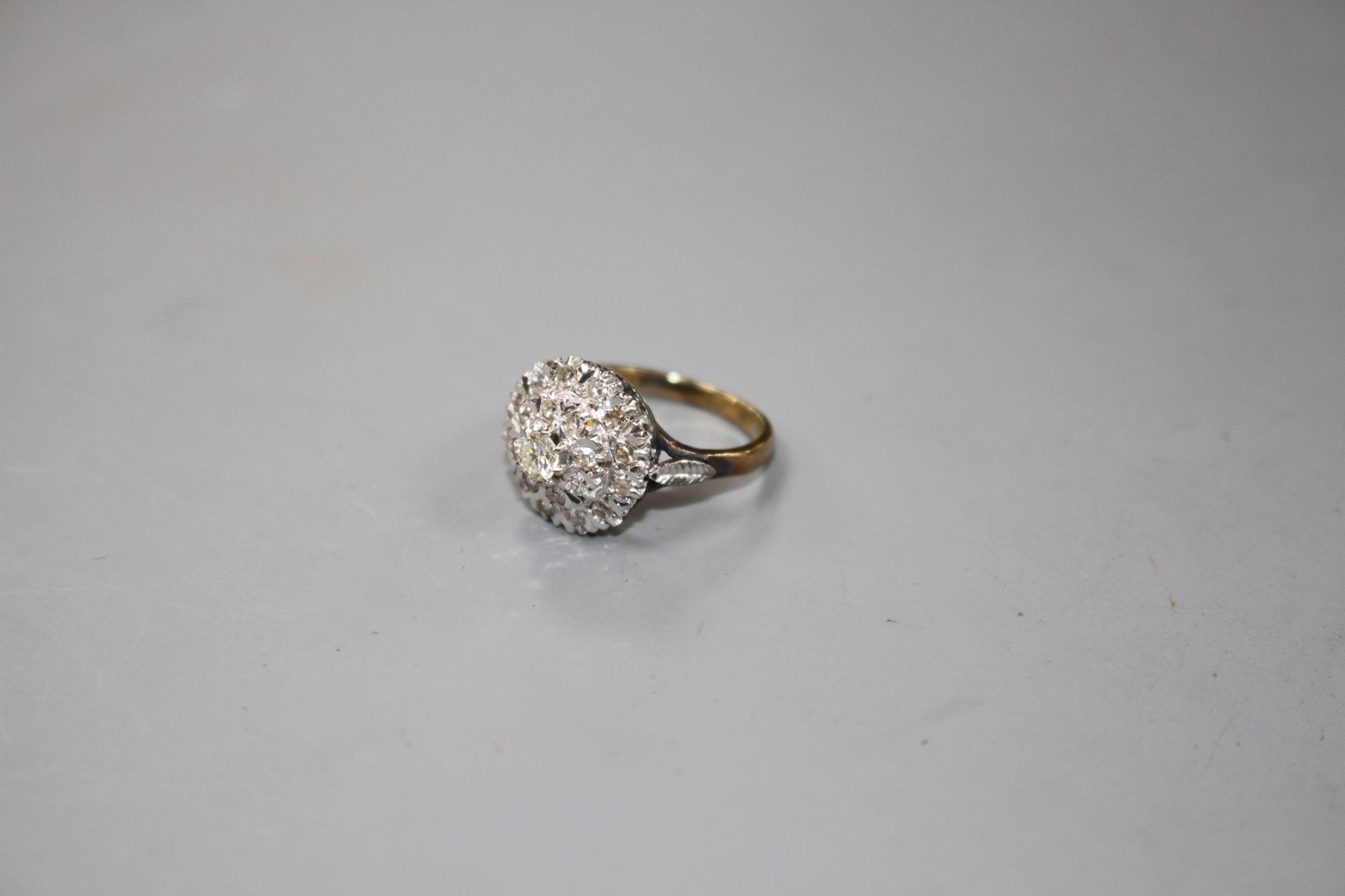 A 1960's 18ct gold and illusion set diamond cluster ring, size J, gross weight 4.6 grams. - Image 2 of 4