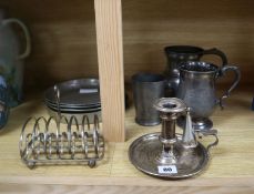 A Victorian silver plated chamberstick, pewter tankards, plates and a toast rack Condition:- bell