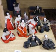 A set of five Japanese late Meiji period Hinamatsuri lacquered wood and fabric female dolls and five