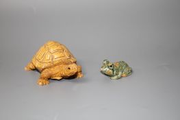 A carved fossil stone tortoise, 8cm and a carved Rhiolite carving of a frog, 4cm Condition: Both