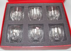 A boxed set of six Baccarat cut glass whisky tumblers, height 10cm Condition: Very good, probably