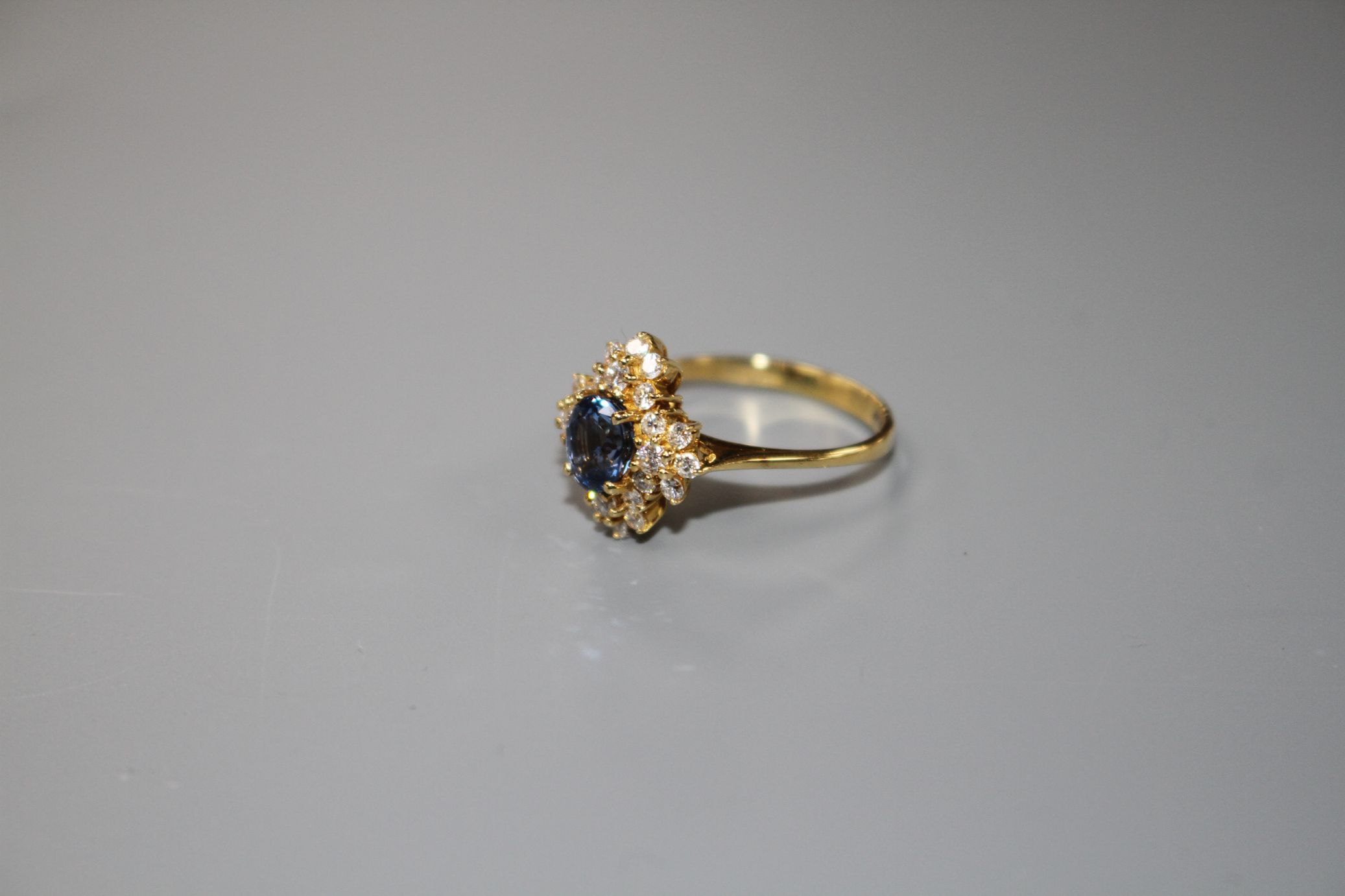 A modern 18ct gold, sapphire and diamonds set quatrefoil shaped cluster ring, size M, gross 4 - Image 2 of 6