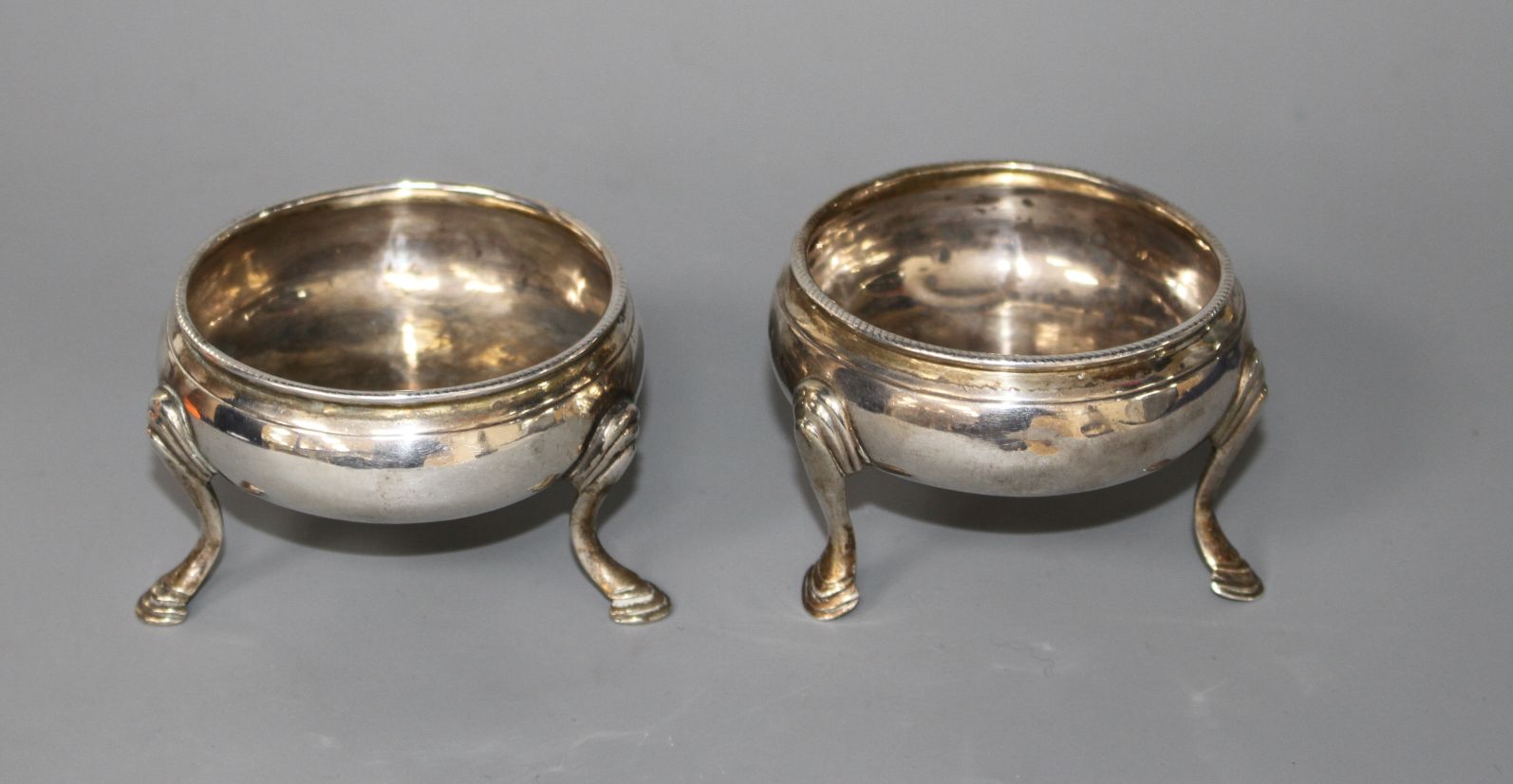 A pair of George III silver bun salts, by Peter & Ann Bateman, London, 1794, 61mm, 2.5ozCondition: