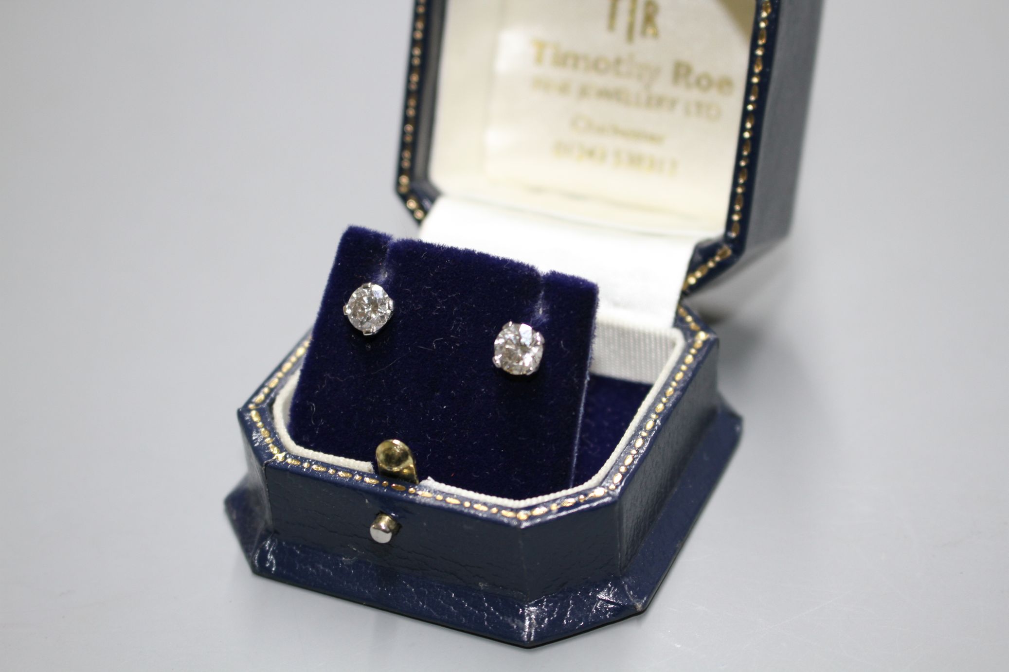 A pair of 18ct white gold and solitaire diamond ear studs, with an approximate total carat weight of - Image 2 of 6