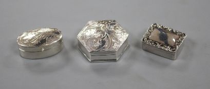 Three assorted modern silver pill boxes, including engraved hexagonal and rectangular with scroll