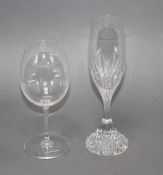 A boxed set of six Baccarat cut glass champagne flutes, height 21.5cm and a boxed pair of Baccarat