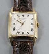 A gentleman's 1950's? 14k Jules Jurgensen manual wind wrist watch, with square tumbling Roman