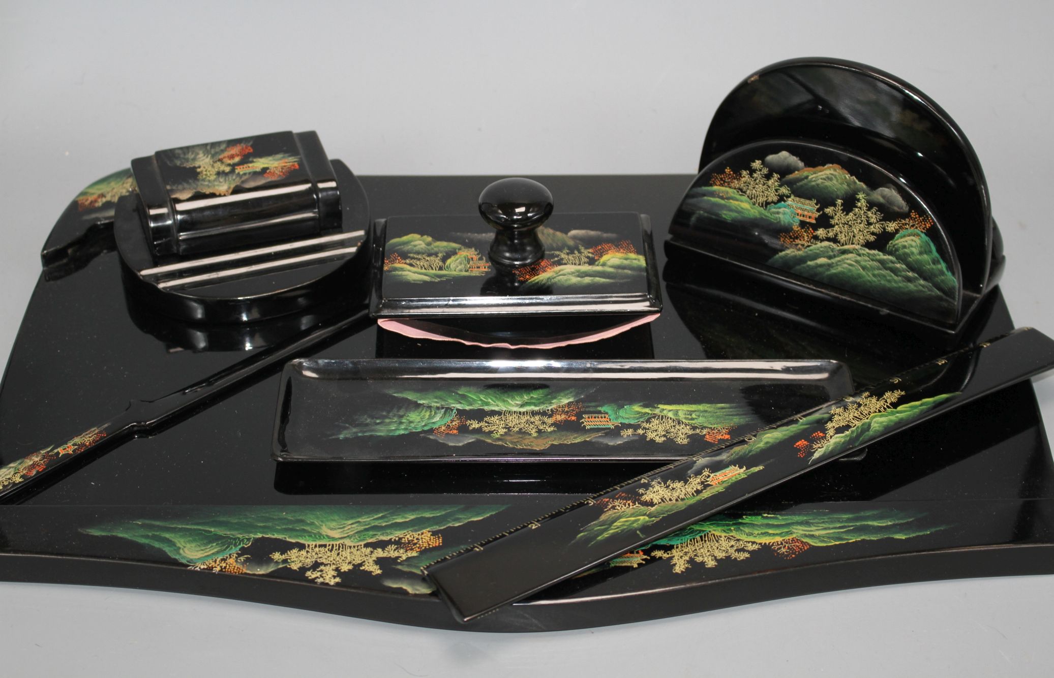 A Chinese Fuzhou (Foochow) lacquer desk set, mid 20th century, tiny flake loss to the edge of the