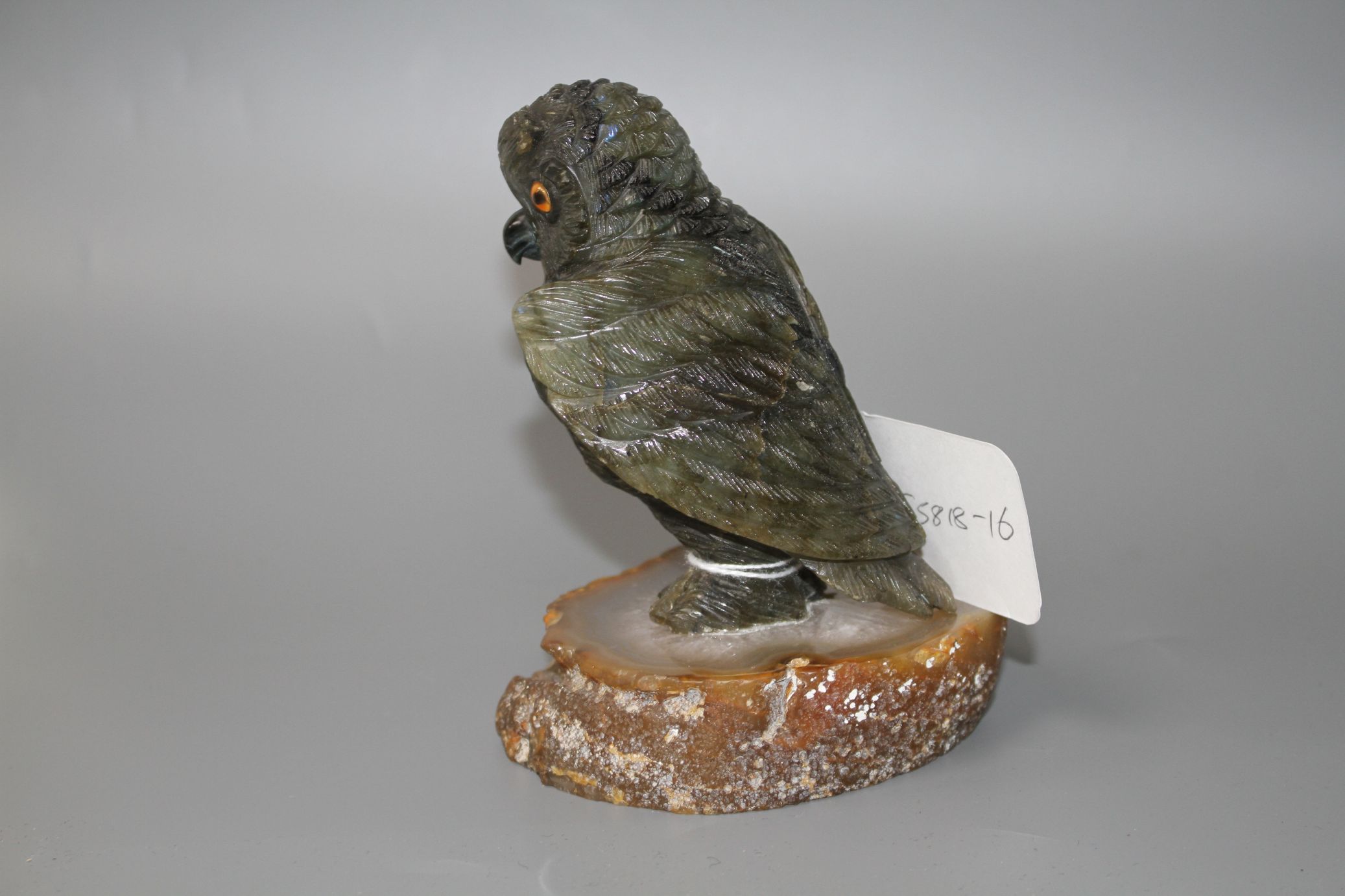 A carved labradorite model of an owl on an agate base, height 12.8cm. Condition: Small flaws that - Image 2 of 4