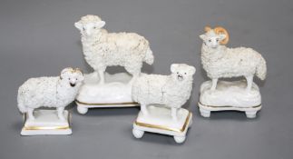 Four Staffordshire porcelain figures of three rams and a ewe c.1830-50, the ram with white horns has