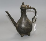 A late 18th century Mughal brass ewer, with incised decoration Condition: Oxidised with some rubbing