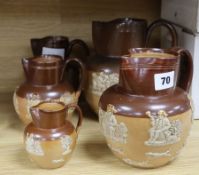 A set of five Royal Doulton graduated stoneware jugs, tallest 19cm Condition: Largest jug has a star