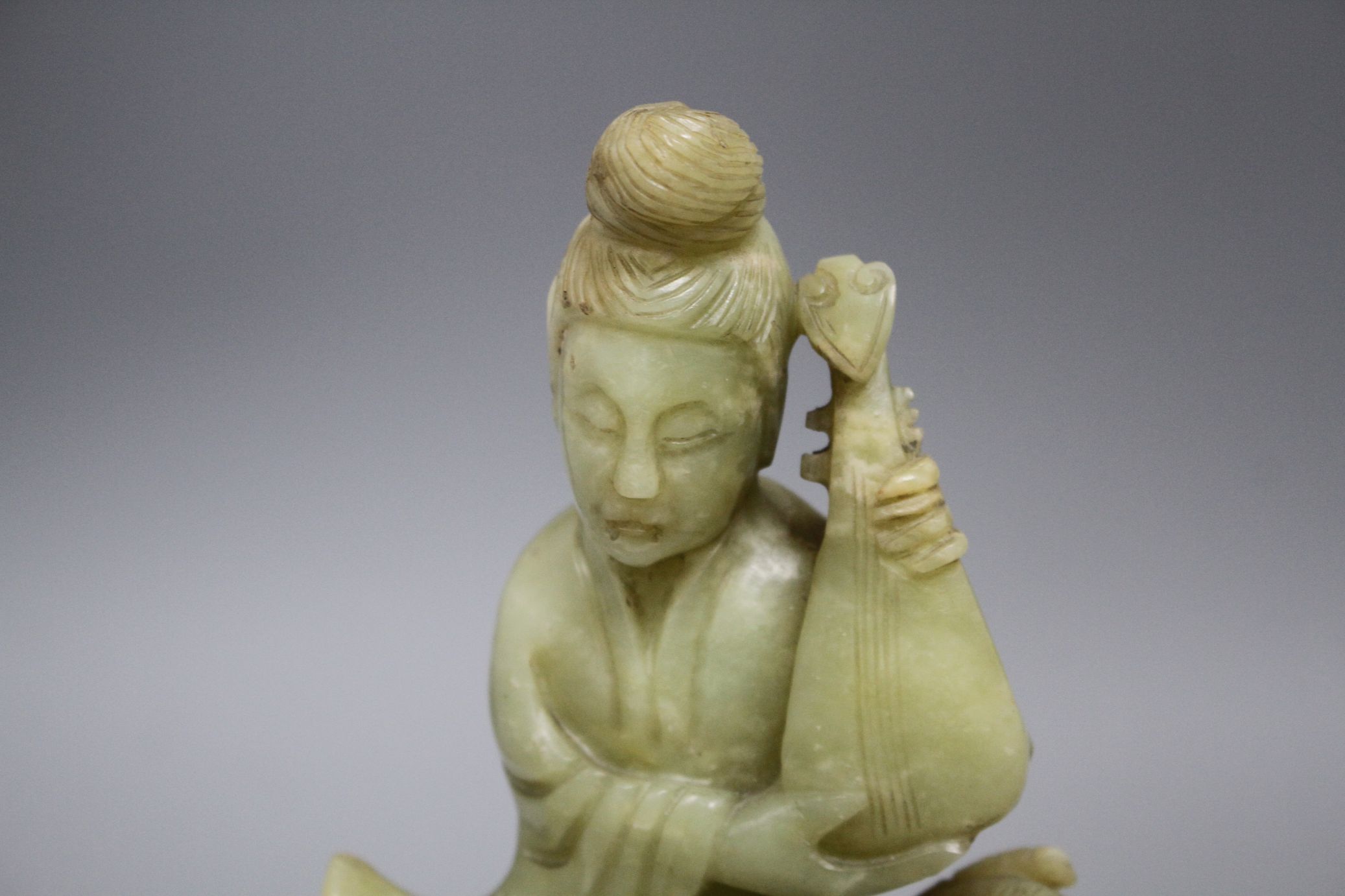 A pair of Chinese bowenite jade groups of a lady riding a horse, wood stands natural inclusions - Image 7 of 9