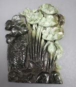 A Chinese carved jadeite group of a leaping carp and lotus flowers, height 30cm Condition: Good