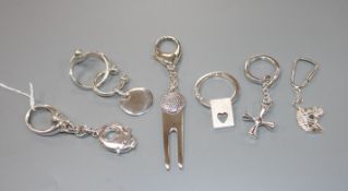 Seven assorted modern silver keyrings including novelty pig and horse's head, largest overall 12.