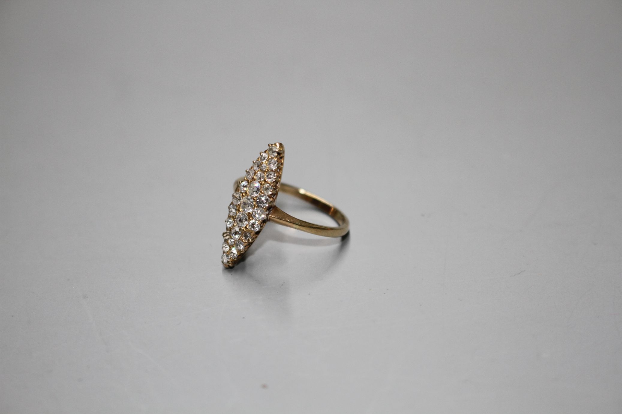 A yellow metal (tests as 18ct) and old round cut diamond set marquise cluster ring, with a total - Image 5 of 7