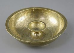 A large brass Persian magic bowl, Qajar dynasty, with inscribed decoration, diameter 21cm Condition: