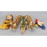 Two 1950's Steiff tigers, a crocodile, a parrot and a lion glove puppet Condition:- first tiger -