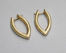 A pair of 20th century Italian 750 yellow metal Pomellato navette shaped earring, signed,