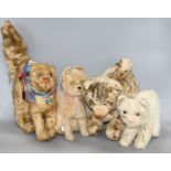 Four large vintage plush soft toy cats Condition:- 1950's white plush seated cat with pale blue /