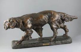 Thomas Francois Cartier (French, 1879-1943). A French bronzed terracotta model of a Gordon Setter,