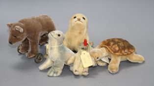 A 1960's Steiff 'Robby' sea lion, another similar larger sea lion, a penguin, a turtle and a more