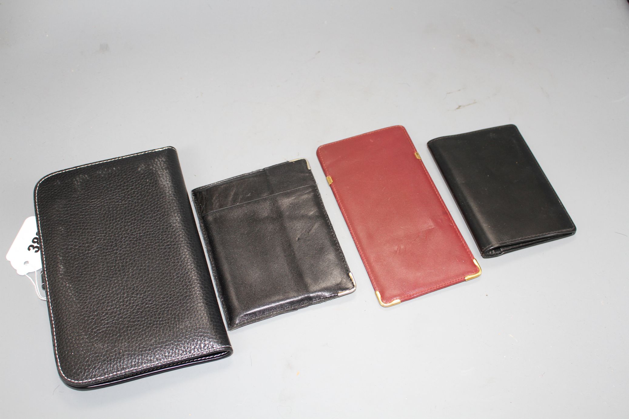 A Hermes leather filofax case, a Cartier leather passport holder, card holder and spectacle case - Image 2 of 3