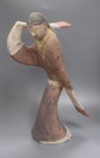 A large Chinese Han style pottery dancer, height 54cm Condition: One or two minute nicks but overall