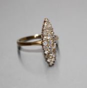 A yellow metal (tests as 18ct) and old round cut diamond set marquise cluster ring, with a total