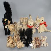 A collection of assorted soft toy cats Condition:- 1950's black plush cat with clear eyes and raised