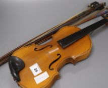 A Chinese violin and four bows Condition:- violin with fair wear and tear, needs stringing otherwise