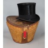 A moleskin top hat in a leather box by Christy's London, J. Norton, Haywards Heath, Internal