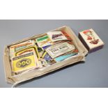 A collection of assorted matchbox labels