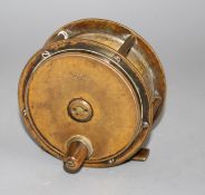 An early brass 4.5in. fishing reel by Army & Navy Cooperative Stores Ltd., engraved mark, diameter