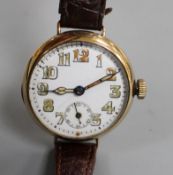 A gentleman's 1920's 9ct. gold manual wind wristwatch, with case back inscription. Condition: A