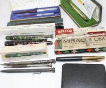 A group of assorted fountain pens and propelling pencils - Cross gilt ballpoint, in original box