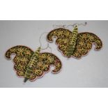 A pair of Chinese metal thread embroidered green velvet butterfly decorations, occasional patches of