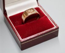 A George V 9ct gold and diamond chip set signet ring, Birmingham, 1929, size R/S, gross 5.3 grams.