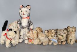 A group of assorted vintage soft toy cats including Steiff Condition:- Steiff? black velvet cat with