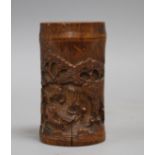 A Chinese bamboo brush pot, carved with scholars playing weiqi, late 19th/early 20th century some