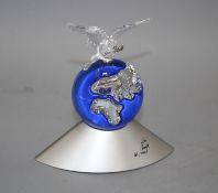 A Swarovski Crystal ornament 'Planet Vision 2000', in original box with certificate, overall