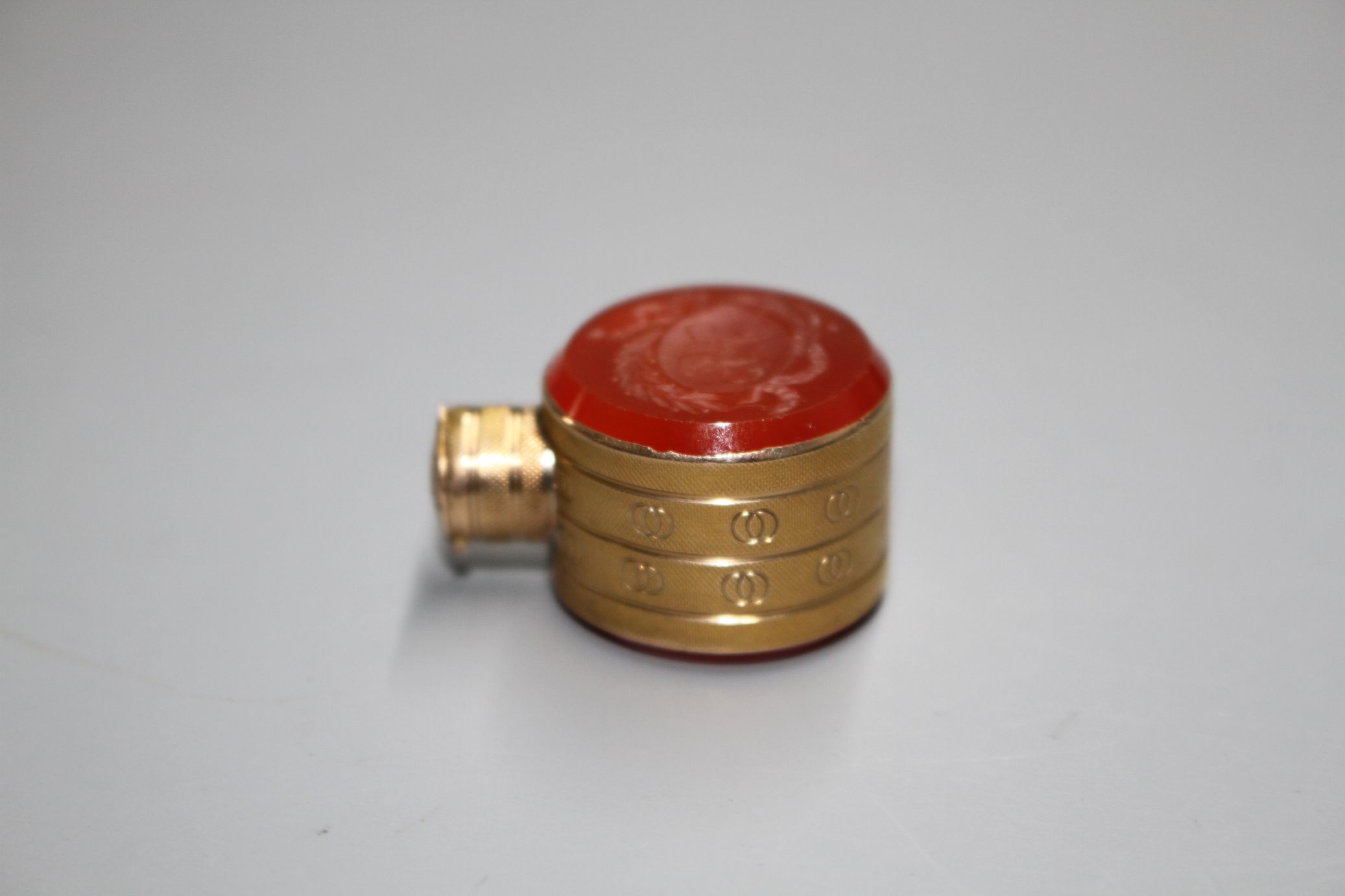 A small 19th century engraved gold and carnelian set moon shaped scent flask, one carnelian carved - Image 4 of 6